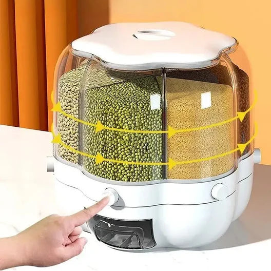 HOMDUCTS product showing a container with compartments filled with green and yellow grains, with a hand pointing at it.