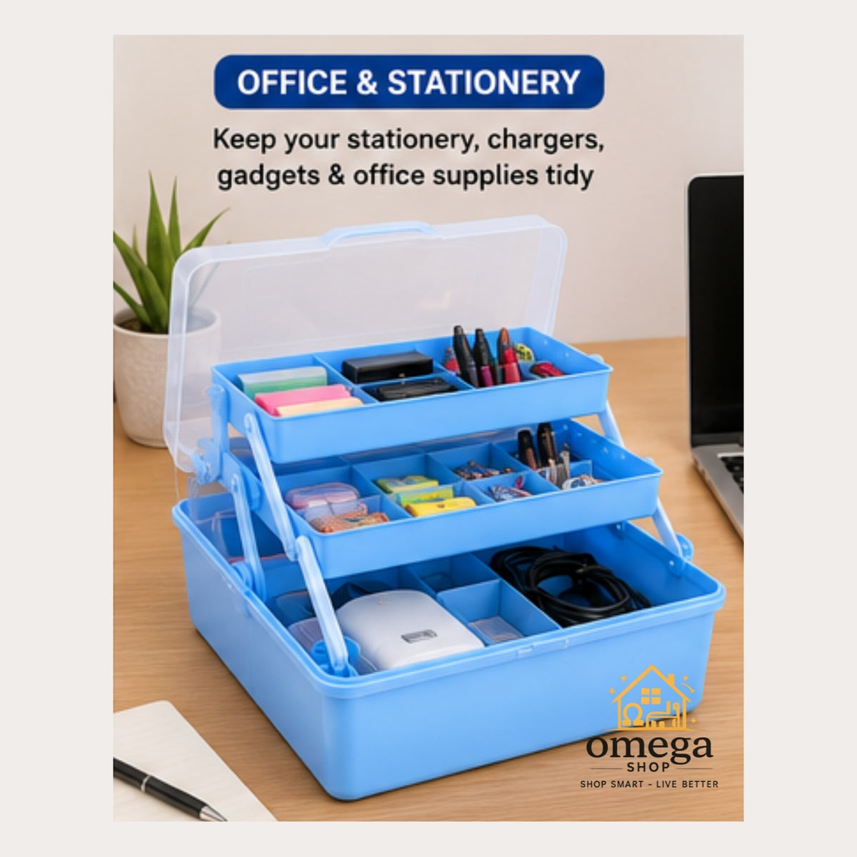 A blue three-tier plastic organizer tray with a clear lid, shown open on a wooden desk and filled with pens, sticky notes, chargers, and office supplies. Text at the top reads 'OFFICE & STATIONERY' and 'Keep your stationery, chargers, gadgets & office supplies tidy.