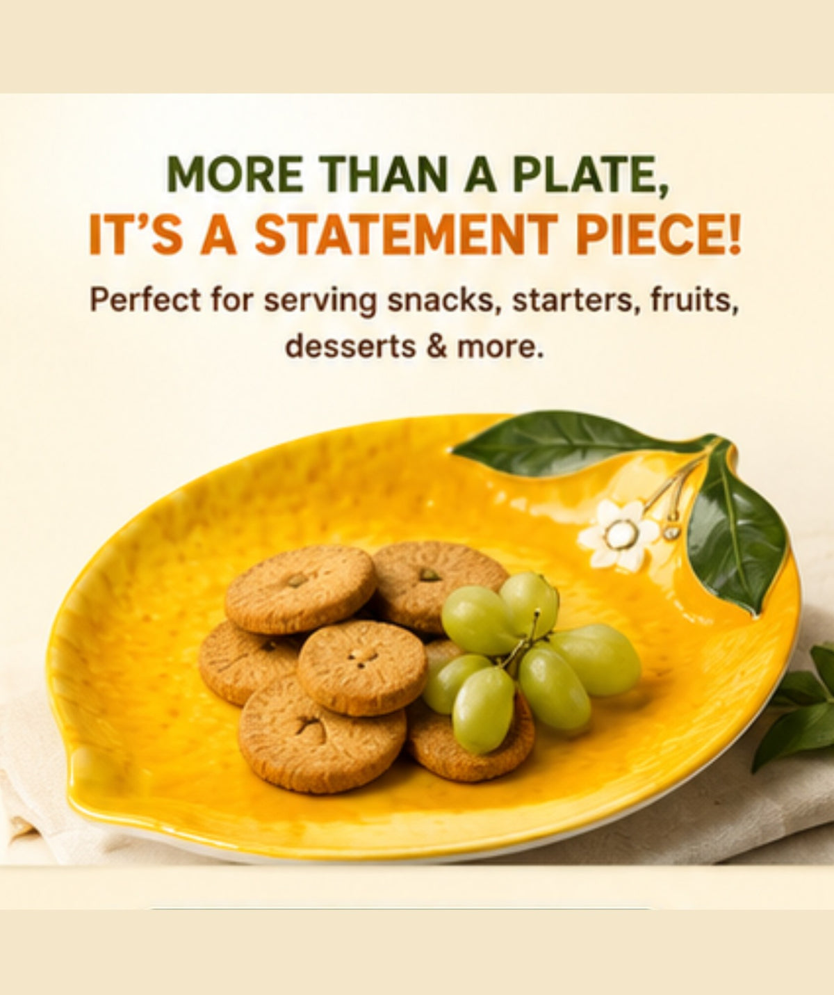 Yellow leaf-shaped plate with cookies and grapes on a beige background