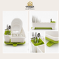 A white and lime green plastic dish rack set shown in multiple product views on a light beige background, with the Omega Shop logo at the top. The set includes a main rack with a lid, plates, glasses, and utensils, plus three smaller detail panels showing the underside, the rack with plates only, and the lid open.