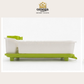 A white plastic baby bathtub with a bright lime green base and matching green accessories, shown against a plain white background with an Omega Shop logo at the top.