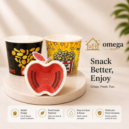 Three snack containers from Omega Shop displayed on a marble pedestal, including a red apple-shaped container in the foreground and two popcorn-themed cups behind it. Text on the right reads 'Snack Better, Enjoy' with the Omega Shop logo, and feature callouts appear along the bottom.