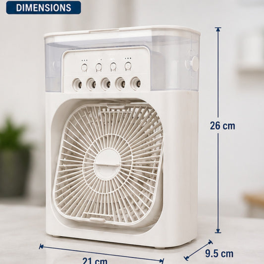 A small white fan with a clear upper cover and measurement annotations showing dimensions of 26 cm height, 21 cm width, and 9.5 cm depth, on a light indoor background.